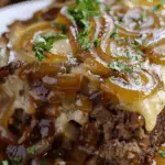 Crockpot French Onion Meatloaf with Melted Swiss Cheese