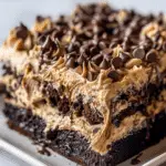 Chocolate Peanut Butter Poke Cake That’s Moist, Rich, and Completely Addictive